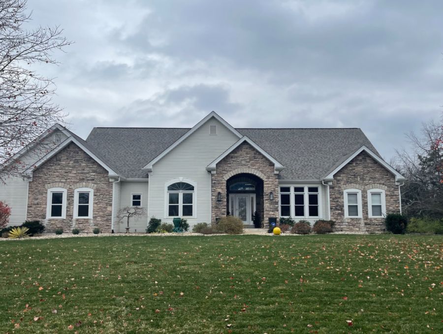 Completed siding installation by Coldstream Exteriors